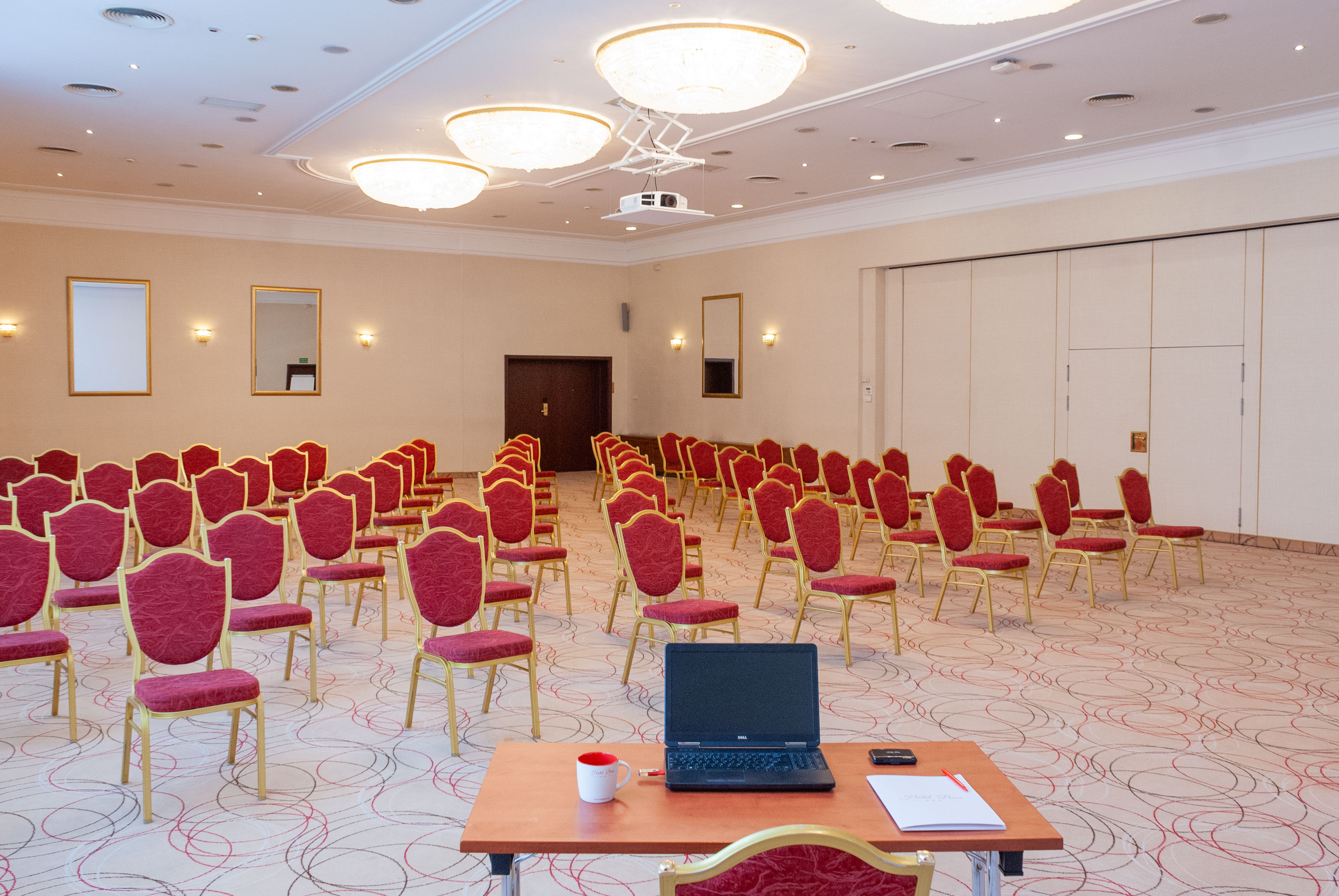 Real Estate Photography - Conference Room Red Chairs Table Laptop Cup Notes