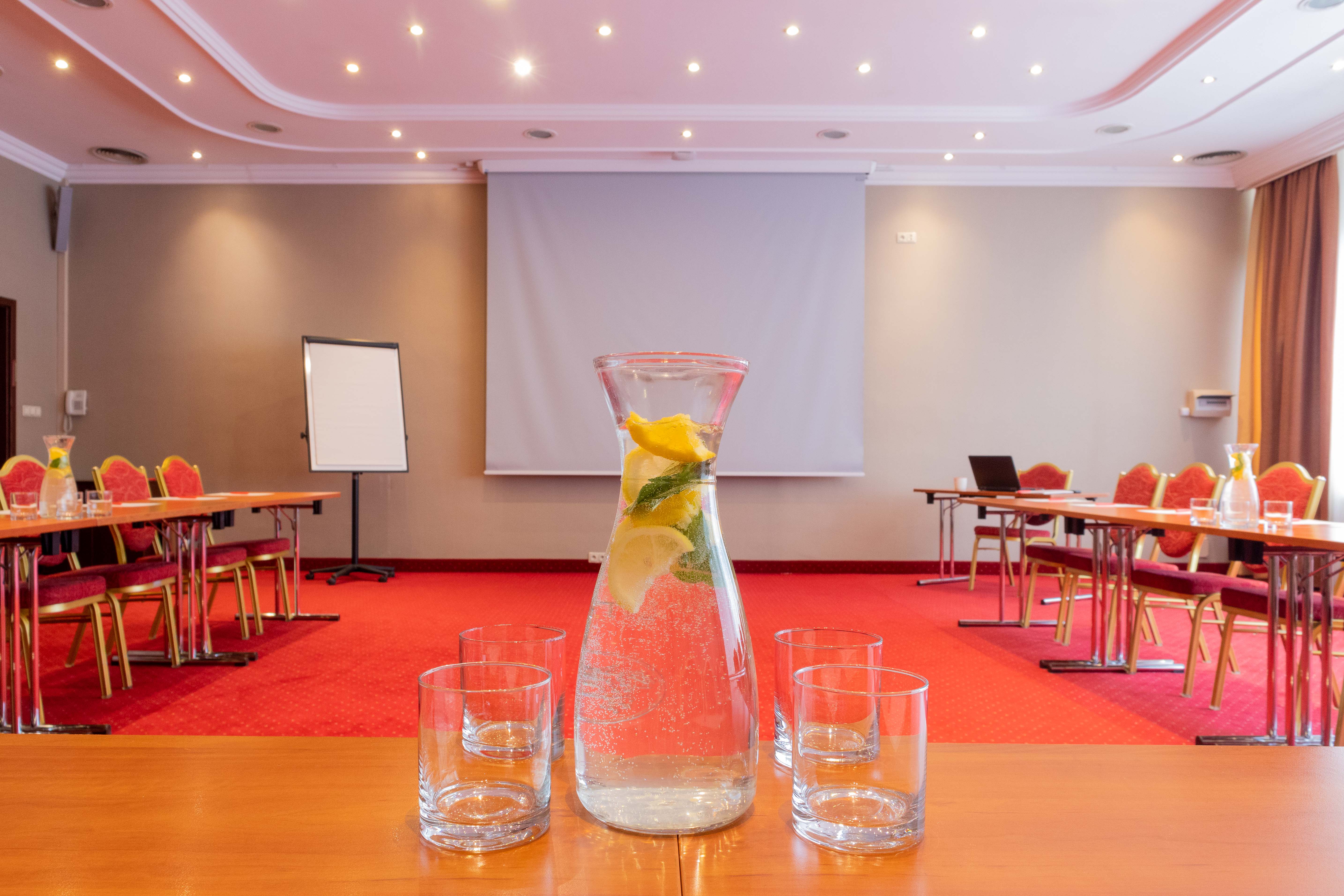 Real Estate Photography - Conference Room Red Carpet Drink Lemon